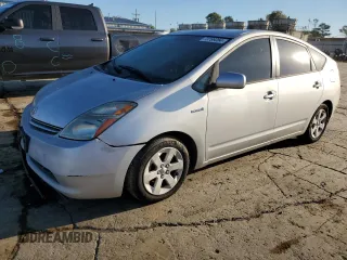2007 Toyota Prius z VIN JTDKB20U377666109, wystawiony jako Copart lot #73769364 z przebiegiem Nie podano mil oraz Czysty tytuł • Clean title. Historia ofert i sprzedaży dostępna na DreamBid. Obrazek 1.