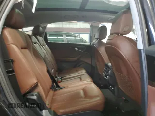2018 Audi Q7 Prestige z VIN WA1VAAF74JD014629, wystawiony jako Copart lot #51574855 z przebiegiem Nie podano mil oraz Szkoda całkowita • Salvage title. Historia ofert i sprzedaży dostępna na DreamBid. Obrazek 11.