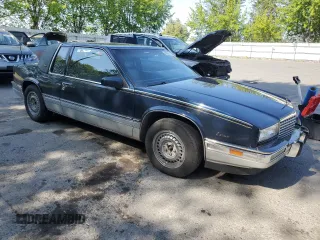 1988 Cadillac Eldorado z VIN 1G6EL1155JU600524, wystawiony jako Copart lot #59505125 z przebiegiem 110 972 mil mil oraz Szkoda całkowita • Salvage title. Historia ofert i sprzedaży dostępna na DreamBid. Obrazek 4.
