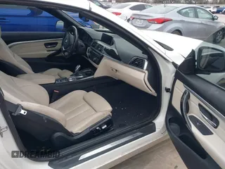 2018 BMW 4 Series 430i with VIN WBA4Z1C59JEC59501, listed as a IAAI auction lot 41588339 with 76,151 mi miles and . Bid and sale history available at carsss.com. Image 5.