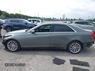 2016 Cadillac CTS Luxury Collection RWD with VIN 1G6AR5SXXG0108544, listed as a IAAI auction lot 41985630 with 86,014 mi miles and . Bid and sale history available at DreamBid. Image 15.