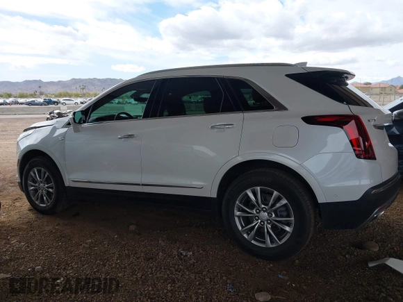 2021 Cadillac XT5 FWD Premium Luxury with VIN 1GYKNCRS5MZ224957, listed as a IAAI auction lot 41794648 with 28,540 mi miles and . Bid and sale history available at carsss.com. Image 14.