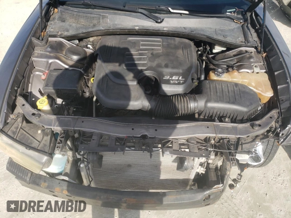 2013 Dodge Charger SXT with VIN 2C3CDXHG9DH696889, listed as a Copart auction lot 42578885 with 166,226 mi miles and Salvage Title. Bid and sale history available at carsss.com. Image 12.