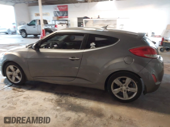 2013 Hyundai Veloster w/Gray Int with VIN KMHTC6AD4DU117924, listed as a IAAI auction lot 41339465 with 156,004 mi miles. Bid and sale history available at carsss.com. Image 15.