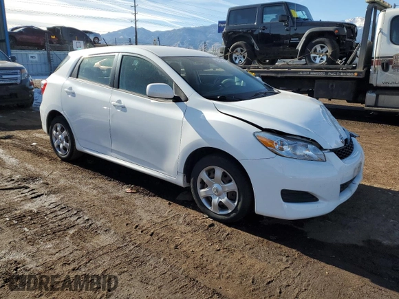 2009 Toyota Matrix with VIN 2T1KU40E39C131068, listed as a Copart auction lot 84394884 with 56,347 mi miles and Salvage Title. Bid and sale history available at DreamBid. Image 4.