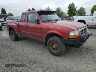 1999 Ford Ranger XL with VIN 1FTZR15V1XTA94373, listed as a Copart auction lot 62235815 with 197,125 mi miles and Clean title. Bid and sale history available at DreamBid. Image 4.