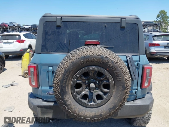 2021 Ford Bronco z VIN 1FMDE5CP5MLA98340, wystawiony jako IAAI lot #42064998 z przebiegiem 38 569 mil mil oraz . Historia ofert i sprzedaży dostępna na DreamBid. Obrazek 17.