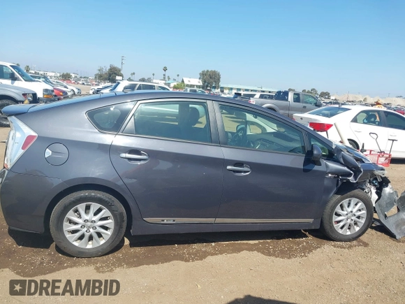 2012 Toyota Prius with VIN JTDKN3DP5C3011792, listed as a IAAI auction lot 42544789 with 127,704 mi miles and . Bid and sale history available at DreamBid. Image 13.