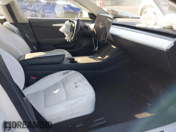 2022 Tesla Model 3 with VIN 5YJ3E1EA4NF319237, listed as a IAAI auction lot 41263761 with 44,384 mi miles and . Bid and sale history available at DreamBid. Image 5.