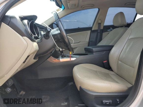 2015 Kia Optima EX с VIN 5XXGN4A71FG385837, выставлен на аукционе Copart как лот 60113905 с пробегом 172 274 миль миль и Списание • Salvage title. История ставок и продаж доступна на DreamBid. Изображение 7.