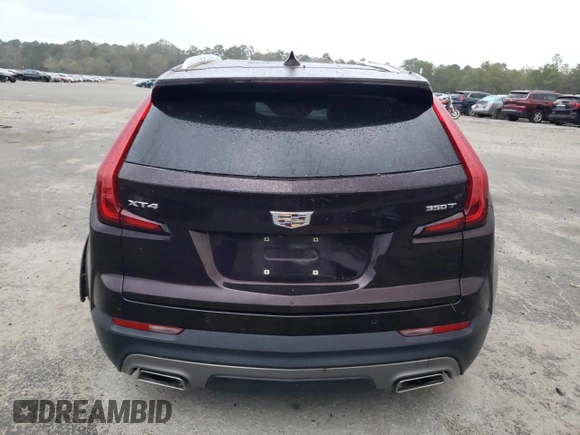 2020 Cadillac XT4 FWD Premium Luxury with VIN 1GYFZCR42LF149030, listed as a Copart auction lot 82671894 with 88,570 mi miles and Salvage title. Bid and sale history available at DreamBid. Image 6.