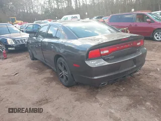 2014 Dodge Charger SXT Plus with VIN 2C3CDXJG7EH138261, listed as a IAAI auction lot 41546437 with 224,129 mi miles. Bid and sale history available at carsss.com. Image 3.