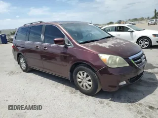 2007 Honda Odyssey Touring with VIN 5FNRL38827B062909, listed as a Copart auction lot 54449875 with 198,457 mi miles and Clean Title. Bid and sale history available at carsss.com. Image 4.