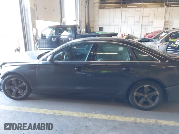 2013 Audi A6 Premium Plus z VIN WAUGFAFC6DN083752, wystawiony jako IAAI lot #41550154 z przebiegiem 151 910 mil mil oraz . Historia ofert i sprzedaży dostępna na DreamBid. Obrazek 15.