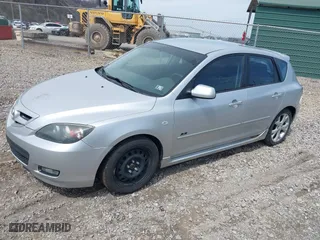 2009 Mazda Mazda3 s Touring with VIN JM1BK344591216032, listed as a IAAI auction lot 42005781 with 135,609 mi miles. Bid and sale history available at carsss.com. Image 2.