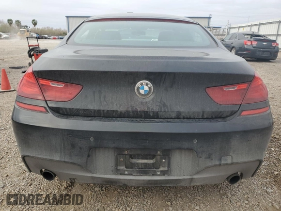 2015 BMW 6 Series 640i xDrive z VIN WBA6B8C58FD453291, wystawiony jako Copart lot #45531765 z przebiegiem 93 666 mil mil oraz Szkoda całkowita • Salvage title. Historia ofert i sprzedaży dostępna na DreamBid. Obrazek 6.
