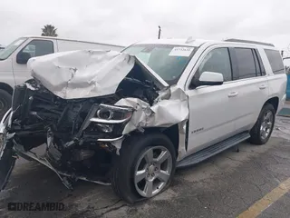 2018 Chevrolet Tahoe LT with VIN 1GNSKBKC7JR351112, listed as a IAAI auction lot 41732631 with 103,771 mi miles. Bid and sale history available at carsss.com. Image 2.