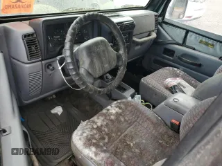 1998 Jeep Wrangler Sport z VIN 1J4FY19S7WP801709, wystawiony jako Copart lot #64495985 z przebiegiem 260 798 mil mil oraz Czysty tytuł • Clean title. Historia ofert i sprzedaży dostępna na DreamBid. Obrazek 8.