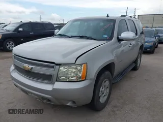 2007 Chevrolet Tahoe LS with VIN 1GNFC13C57R417897, listed as a IAAI auction lot 42588952 with 212,919 mi miles and . Bid and sale history available at DreamBid. Image 2.