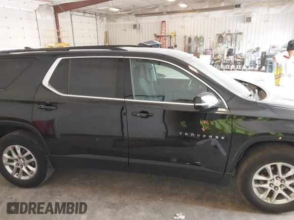 2019 Chevrolet Traverse LT Cloth z VIN 1GNEVGKW6KJ313527, wystawiony jako IAAI lot #42428710 z przebiegiem 117 306 mil mil oraz . Historia ofert i sprzedaży dostępna na DreamBid. Obrazek 13.