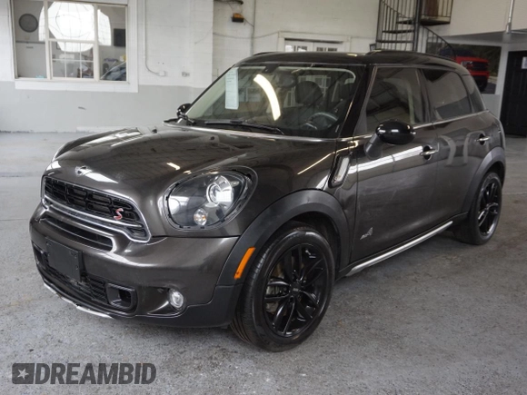 2016 MINI Countryman S with VIN WMWZC5C55GWU00997, listed as a Copart auction lot 58840965 with 41,217 mi miles and Salvage title. Bid and sale history available at DreamBid. Image 2.