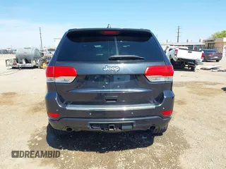 2015 Jeep Grand Cherokee Overland with VIN 1C4RJECG3FC635327, listed as a IAAI auction lot 41910559 with 118,519 mi miles and . Bid and sale history available at DreamBid. Image 16.