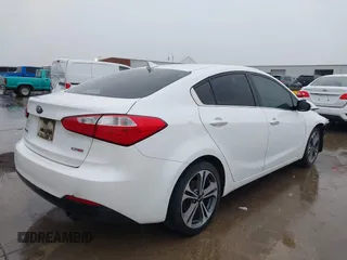 2016 Kia Forte EX with VIN KNAFX4A82G5450616, listed as a IAAI auction lot 42107042 with 131,419 mi miles. Bid and sale history available at carsss.com. Image 4.