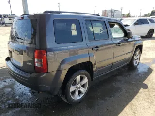 2014 Jeep Patriot Latitude with VIN 1C4NJPFB9ED822901, listed as a Copart auction lot 51005655 with 130,149 mi miles and Salvage Title. Bid and sale history available at carsss.com. Image 3.