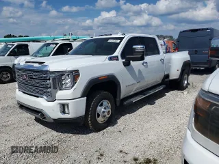 2020 GMC Sierra 3500HD Denali z VIN 1GT49WEY0LF236528, wystawiony jako Copart lot #67557524 z przebiegiem 63 622 mil mil oraz Szkody całkowita. Historia ofert i sprzedaży dostępna na DreamBid. Obrazek 1.