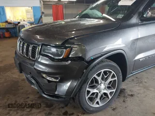 2021 Jeep Grand Cherokee 80th Anniversary z VIN 1C4RJFBG1MC831772, wystawiony jako IAAI lot #42227486 z przebiegiem 50 082 mil mil oraz . Historia ofert i sprzedaży dostępna na DreamBid. Obrazek 6.