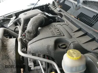 2018 Ram 1500 Rebel z VIN 1C6RR7YT4JS151036, wystawiony jako IAAI lot #41988370 z przebiegiem 72 587 mil mil oraz . Historia ofert i sprzedaży dostępna na DreamBid. Obrazek 20.