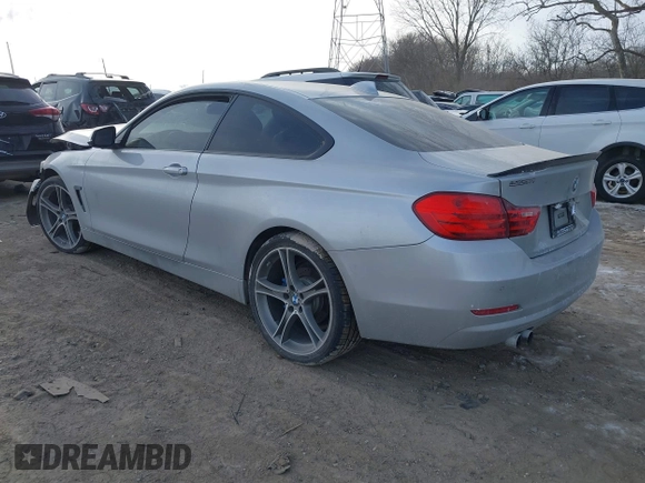 2015 BMW 4 Series 428i xDrive with VIN WBA3N9C53FK247985, listed as a IAAI auction lot 41395534 with 76,856 mi miles and . Bid and sale history available at DreamBid. Image 3.