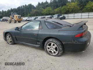 1997 Mitsubishi 3000GT z VIN JA3AM44H9VY001753, wystawiony jako Copart lot #76074634 z przebiegiem 114 056 mil mil oraz Czysty tytuł • Clean title. Historia ofert i sprzedaży dostępna na DreamBid. Obrazek 2.
