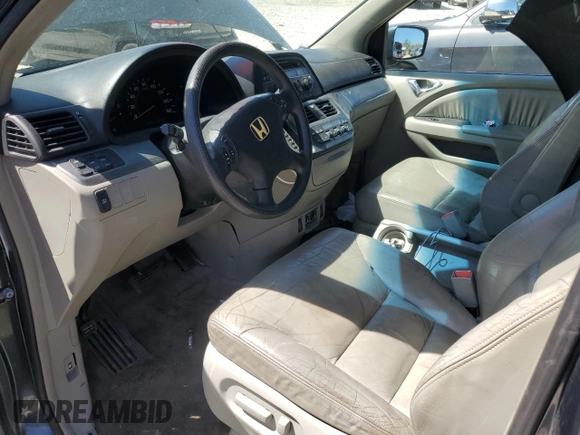 2005 Honda Odyssey EX-L z VIN 5FNRL38655B060017, wystawiony jako Copart lot #55337445 z przebiegiem 206 843 mil mil oraz Czysty tytuł • Clean title. Historia ofert i sprzedaży dostępna na DreamBid. Obrazek 8.