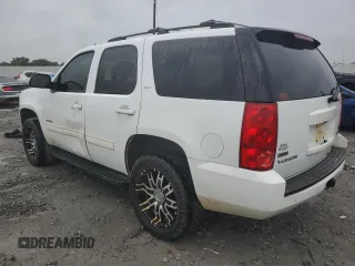 2011 GMC Yukon SLT with VIN 1GKS1CE09BR154032, listed as a Copart auction lot 69023864 with 246,494 mi miles and Salvage Title. Bid and sale history available at carsss.com. Image 2.