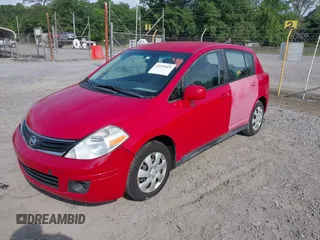 2012 Nissan Versa S with VIN 3N1BC1CP2CL374585, listed as a IAAI auction lot 42209609 with 196,501 mi miles. Bid and sale history available at carsss.com. Image 2.