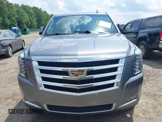 2020 Cadillac Escalade Luxury z VIN 1GYS3BKJ0LR116410, wystawiony jako IAAI lot #42274841 z przebiegiem 75 513 mil mil oraz . Historia ofert i sprzedaży dostępna na DreamBid. Obrazek 6.