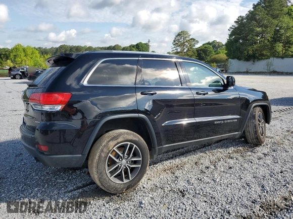 2018 Jeep Grand Cherokee Laredo E with VIN 1C4RJEAGXJC246874, listed as a Copart auction lot 56722005 with 101,493 mi miles and Salvage title. Bid and sale history available at DreamBid. Image 3.