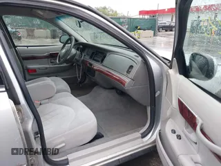 2001 Mercury Grand Marquis GS z VIN 2MEFM74W91X618246, wystawiony jako IAAI lot #42226130 z przebiegiem 125 487 mil mil oraz . Historia ofert i sprzedaży dostępna na DreamBid. Obrazek 5.