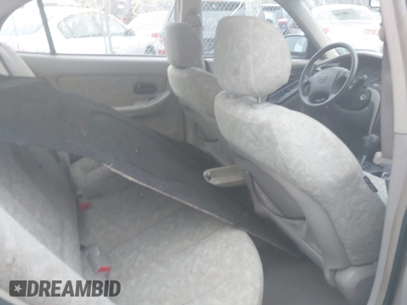 2001 Hyundai Elantra GLS z VIN KMHDN45D71U080537, wystawiony jako IAAI lot #42095959 z przebiegiem Nie podano mil oraz . Historia ofert i sprzedaży dostępna na DreamBid. Obrazek 8.