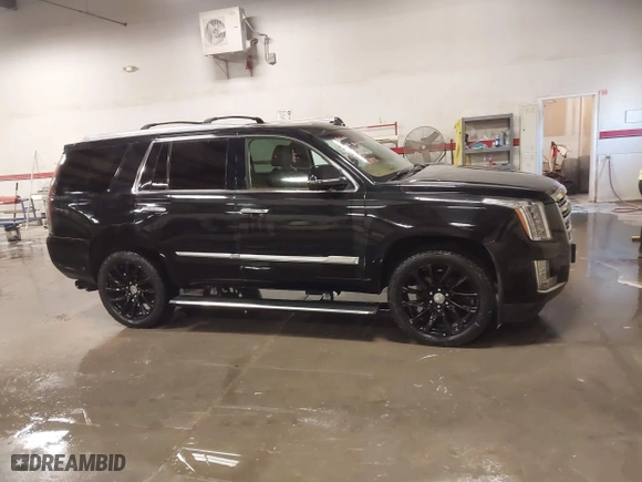 2015 Cadillac Escalade Platinum with VIN 1GYS4PKJ9FR745825, listed as a IAAI auction lot 41201715 with 133,363 mi miles. Bid and sale history available at carsss.com. Image 14.