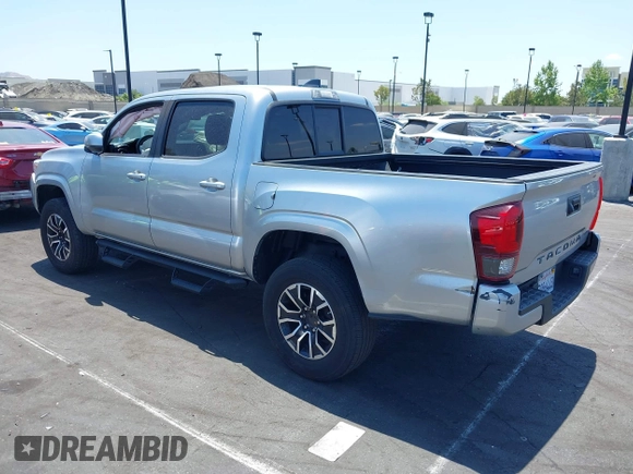 2022 Toyota Tacoma SR with VIN 3TYAX5GN4NT037625, listed as a IAAI auction lot 42382411 with 49,703 mi miles and . Bid and sale history available at DreamBid. Image 3.