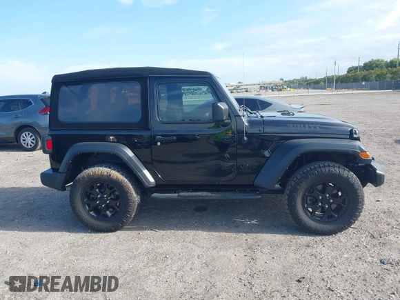 2021 Jeep Wrangler Sport z VIN 1C4GJXAN7MW796019, wystawiony jako IAAI lot #42172407 z przebiegiem 34 128 mil mil oraz . Historia ofert i sprzedaży dostępna na DreamBid. Obrazek 13.