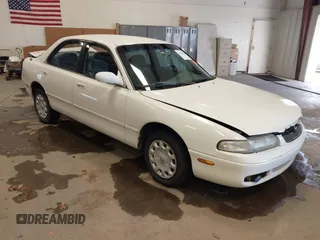 1997 Mazda 626 with VIN 1YVGE22C6V5678839, listed as a IAAI auction lot 41265458 with 298,926 mi miles and . Bid and sale history available at DreamBid. Image 1.