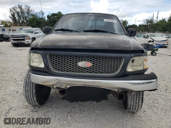 2000 Ford F-150 XL with VIN 1FTZX1721YNC09536, listed as a Copart auction lot 52645405 with 120,638 mi miles and Salvage Title. Bid and sale history available at carsss.com. Image 5.