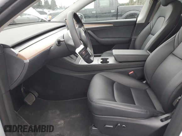 2023 Tesla Model Y Long Range z VIN 7SAYGDEE4PF836872, wystawiony jako Copart lot #45566235 z przebiegiem 7 674 mil mil oraz Szkoda całkowita • Salvage title. Historia ofert i sprzedaży dostępna na DreamBid. Obrazek 7.