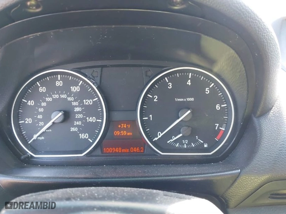 2013 BMW 1 Series 128i with VIN WBAUN1C55DVR01404, listed as a IAAI auction lot 41682695 with 100,948 mi miles. Bid and sale history available at carsss.com. Image 7.