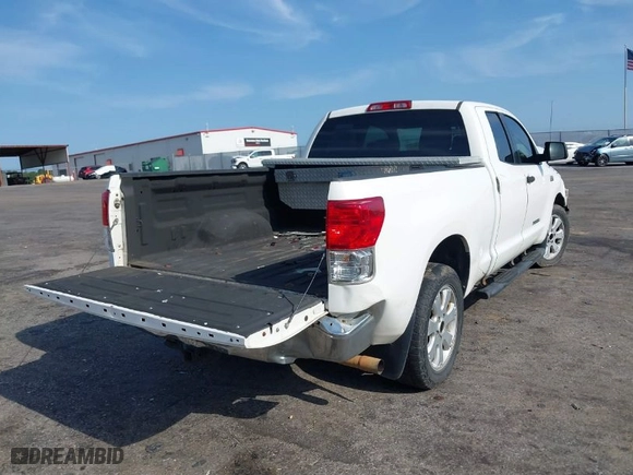 2012 Toyota Tundra 2WD Truck with VIN 5TFRY5F16CX130129, listed as a IAAI auction lot 39975911 with 256,778 mi miles. Bid and sale history available at carsss.com. Image 4.