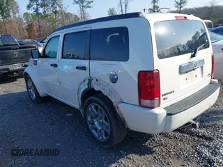 2007 Dodge Nitro R/T with VIN 1D8GU58647W656977, listed as a IAAI auction lot 41508811 with 286,570 mi miles. Bid and sale history available at carsss.com. Image 3.