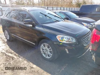 2015 Volvo XC60 T5 Drive-E with VIN YV440MDJ2F2733186, listed as a IAAI auction lot 41478335 with 132,825 mi miles. Bid and sale history available at carsss.com. Image 1.
